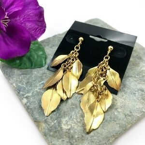 Gold-tone cascading feather dangle earrings​